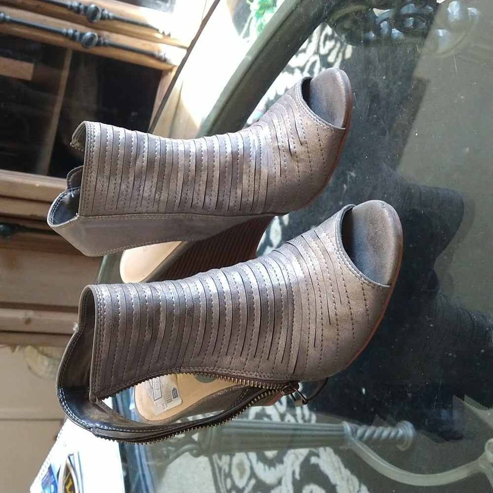Grey heeled boot with open toe